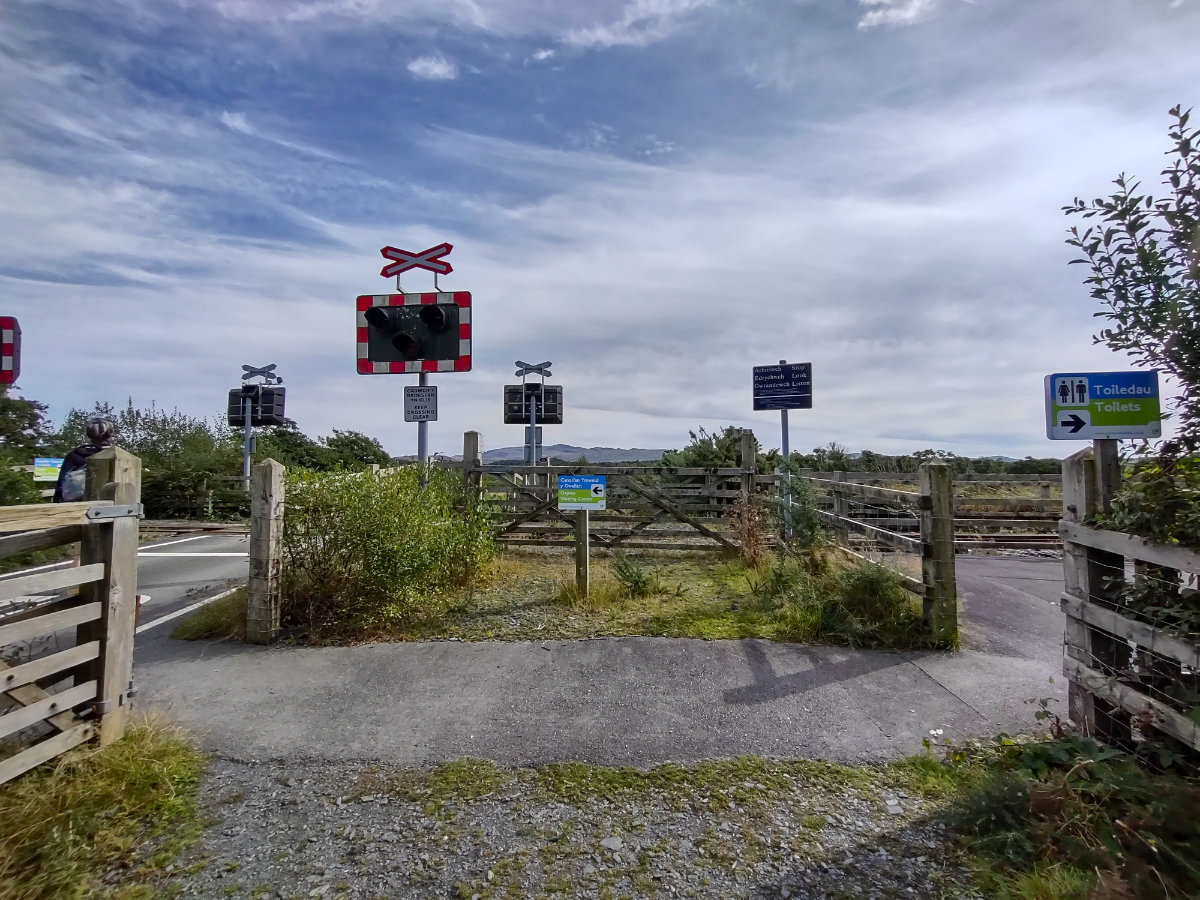 Level crossing entrance - left for the Ospreys, right for train station and toilets